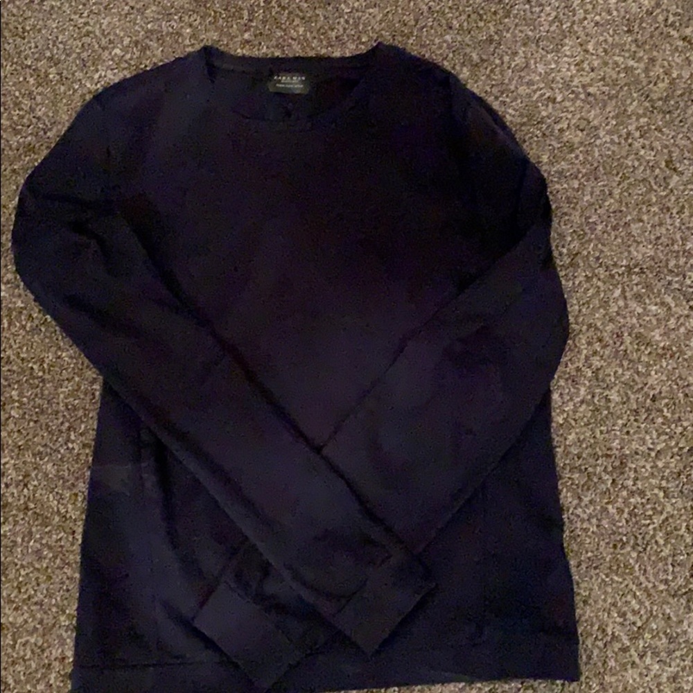 Long sleeved blue shirt